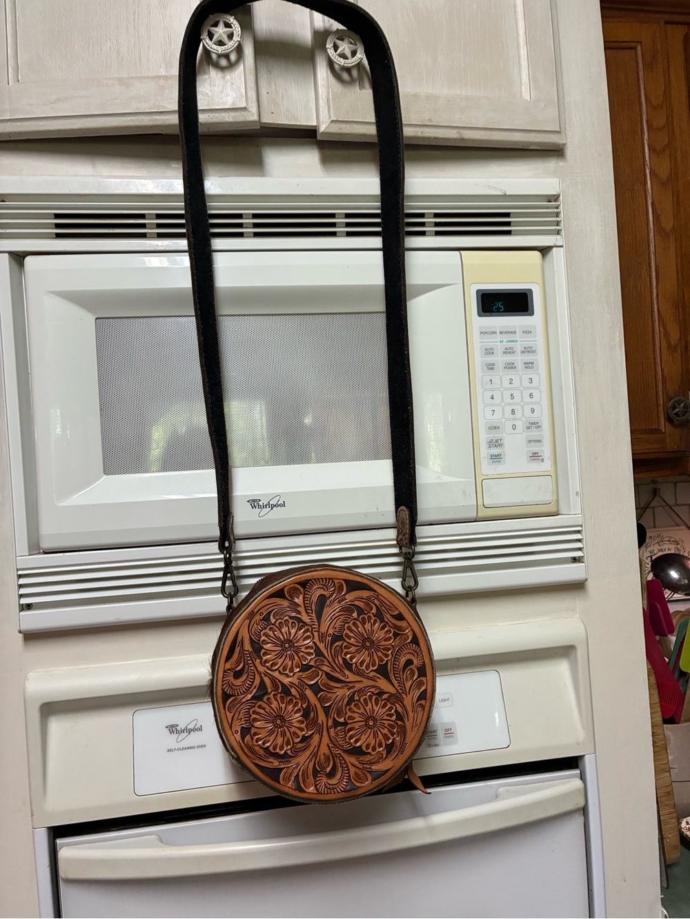 Hand-Tooled Floral Round Crossbody Bag in Brown